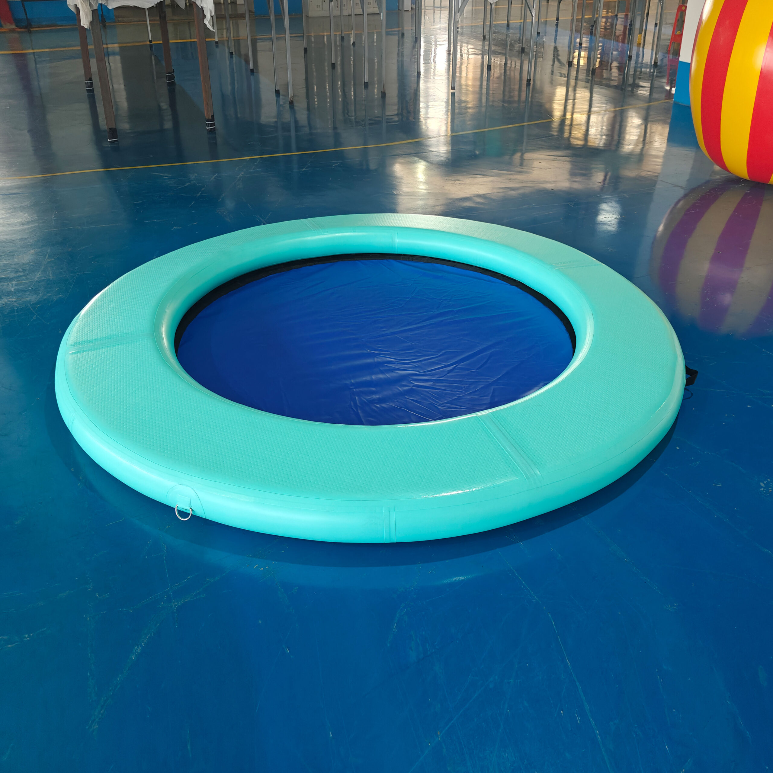 Inflatable floating bed